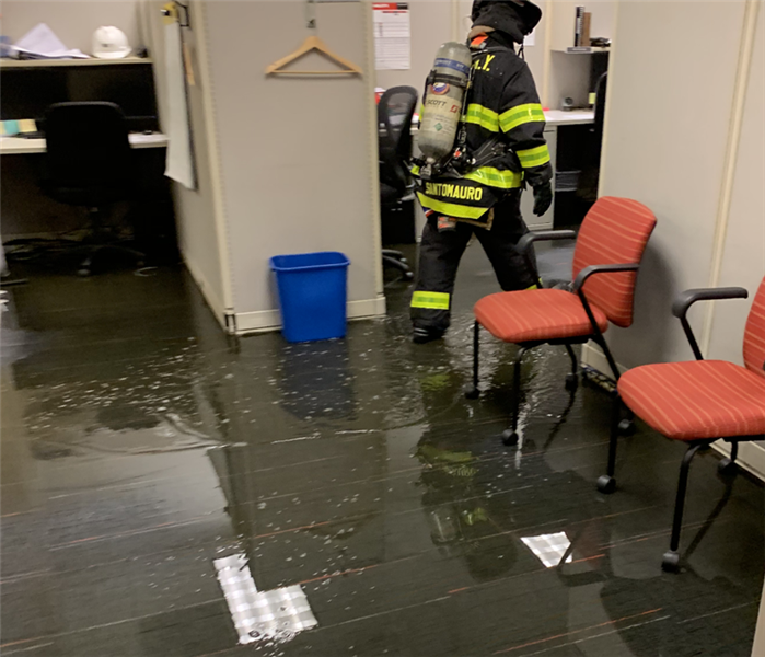 fire fighter in flood